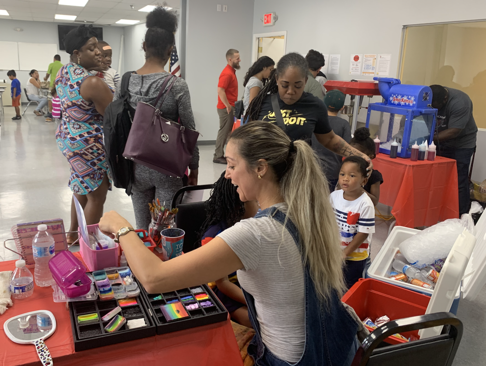 Criminal lawyer adam rossen with marketing assistant Olivia at a community event in coconut creek, florida