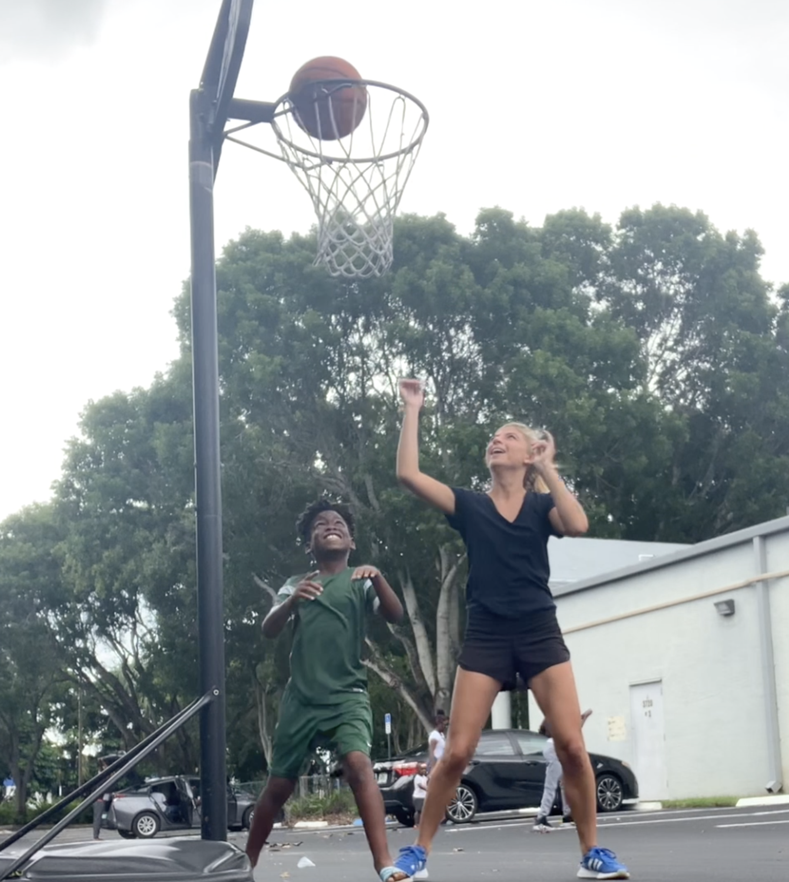 Criminal lawyer adam rossen with marketing assistant Olivia at a community event in coconut creek, florida